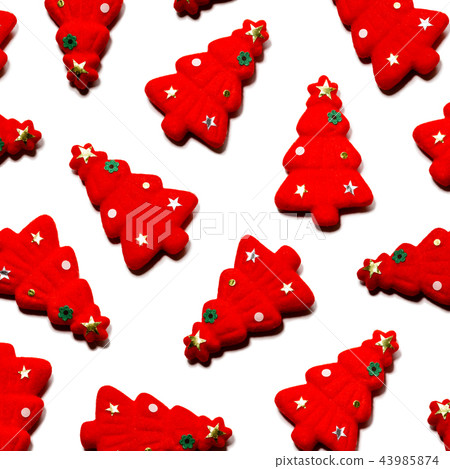 Red Christmas tree studded and put on white background Red Christmas tree studded and put on white background 43985874
