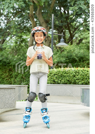 Little skater drinking cocktail Little skater drinking cocktail 43986809