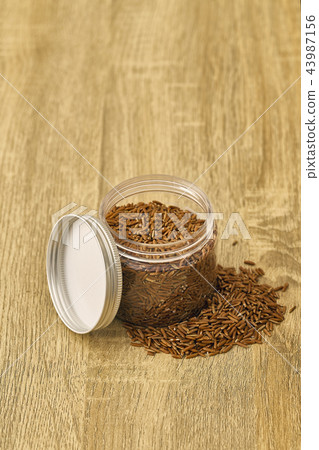 Red rice in glass Jar 43987156
