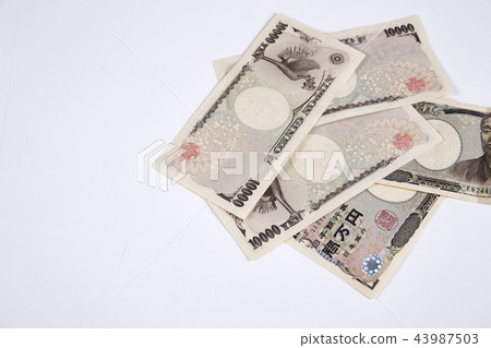 Japanese Yen bills on white 43987503