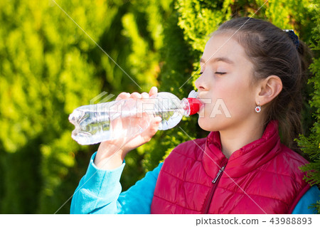 Girl drink water Girl drink water 43988893