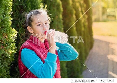 Girl drink water Girl drink water 43988898