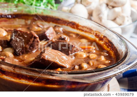 Beef Bourguignon stew in a casserole dish Beef Bourguignon stew in a casserole dish 43989079