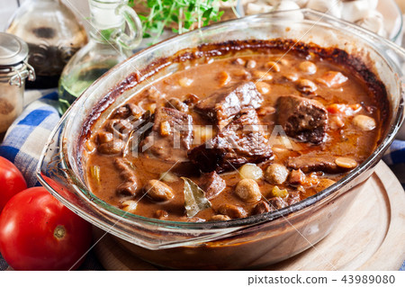 Beef Bourguignon stew in a casserole dish Beef Bourguignon stew in a casserole dish 43989080