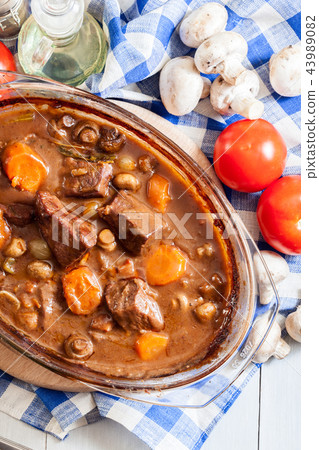 Beef Bourguignon stew in a casserole dish 43989082