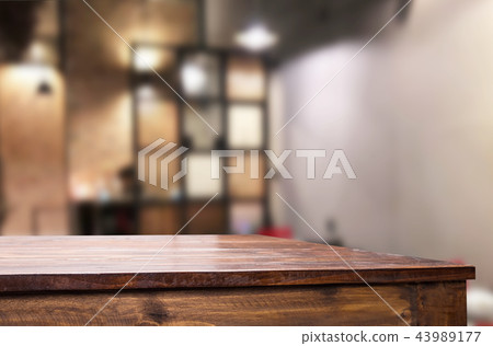 Selected focus empty brown wooden table and Coffee shop or resta Selected focus empty brown wooden table and Coffee shop or resta 43989177