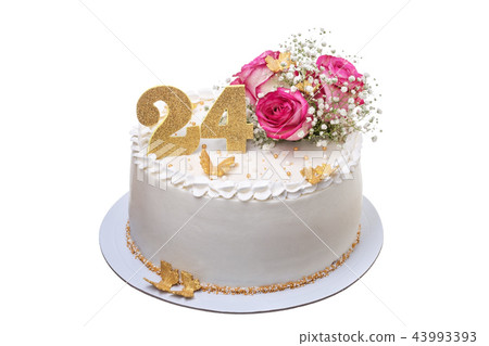 A delicious, festive creamy birthday cake with flowers. A delicious, festive creamy birthday cake with flowers. 43993393