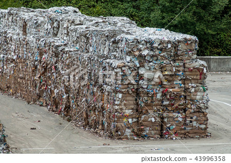 paper in a recycling factory waiting for recycling 43996358