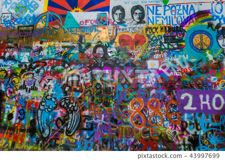 Graffiti on the wall of John Lennon in Prague 43997699