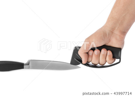 Hand with knife sharpener Hand with knife sharpener 43997714