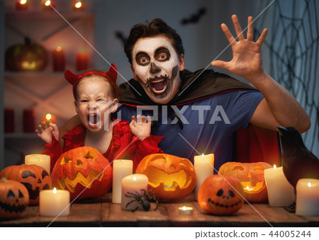 family celebrating Halloween family celebrating Halloween 44005244
