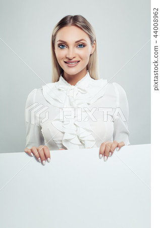 Perfect business woman and white empty board  44008962
