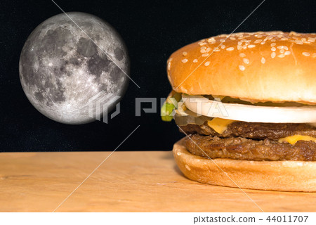 Juicy fast food hamburger with moon 44011707