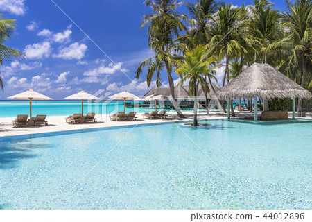 Poolside image of the resort 44012896