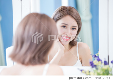 beauty woman touch her face 44012944