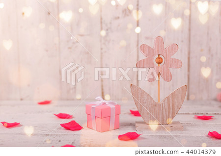 Flowers composition for Valentine's, Mother's or Women's Day. Pink flowers on old white wooden background. 44014379