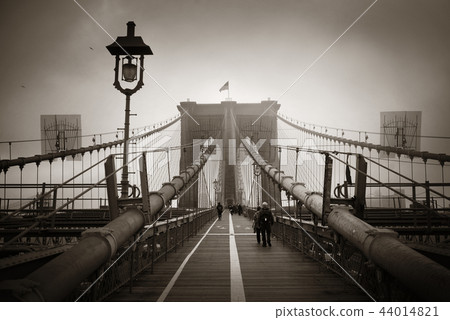 Walk on Brooklyn Bridge in a foggy day Walk on Brooklyn Bridge in a foggy day 44014821