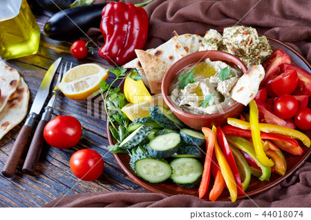 Fresh vegetables and baba ganoush dip, close up Fresh vegetables and baba ganoush dip, close up 44018074