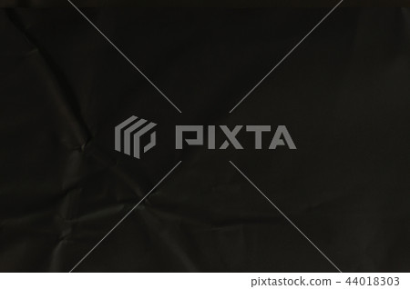 Black paper crumpled texture background 44018303