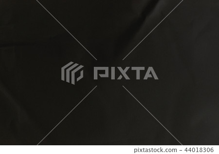Black paper crumpled texture background 44018306