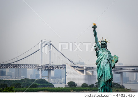 Statue Of Liberty And Tokyo Cityscape Japan Stock Photo