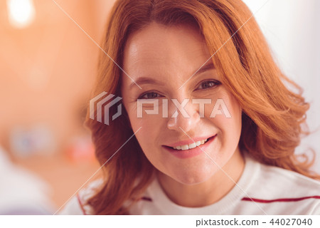 Close up of positive woman smiling 44027040