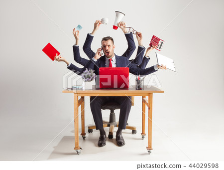 businessman with many hands in elegant suit working with paper, document, contract, folder, business businessman with many hands in elegant suit working with paper, document, contract, folder, business 44029598