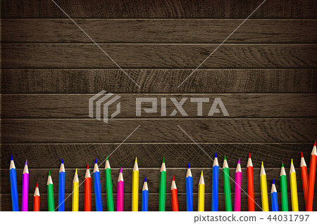 Color pencil on wooden background. 44031797