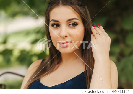 Close up of beautiful pregnant woman. Happy lady smile and rejoiced Close up of beautiful pregnant woman. Happy lady smile and rejoiced 44033305