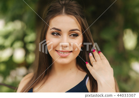 Close up of beautiful pregnant woman. Happy lady smile and rejoiced Close up of beautiful pregnant woman. Happy lady smile and rejoiced 44033307