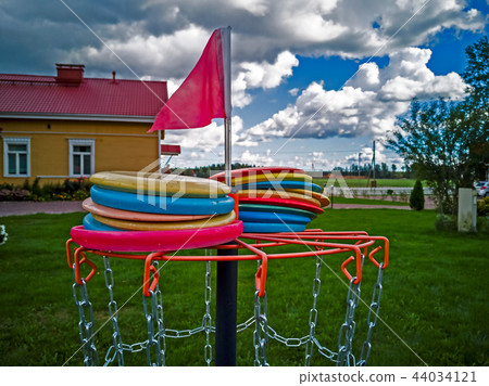 Disk in a disk golf basket Disk in a disk golf basket 44034121