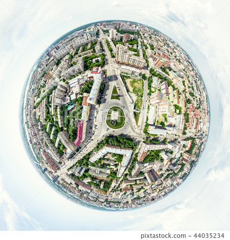 Aerial city view with crossroads and roads, houses, buildings, parks and parking lots. Sunny summer Aerial city view with crossroads and roads, houses, buildings, parks and parking lots. Sunny summer 44035234