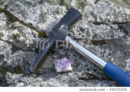 geological hammer and mineral sample 44035830