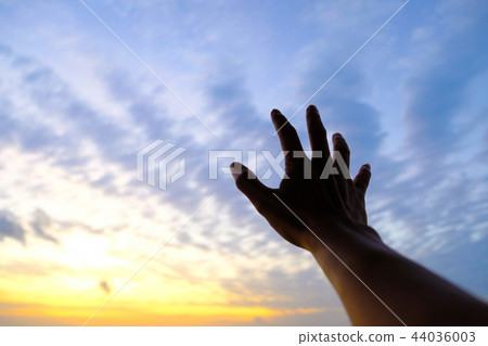 Right hand reaching to the sky. Right hand reaching to the sky. 44036003