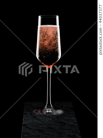 Elegant glass of pink rose champagne with bubbles Elegant glass of pink rose champagne with bubbles 44037377