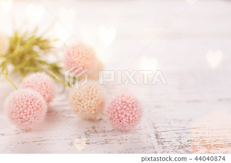 Flowers composition for Valentine's, Mother's or Women's Day. Pink flowers on old white wooden background. 44040874