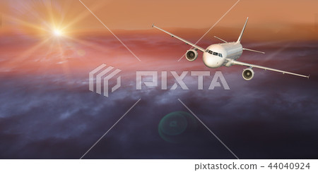 Commercial airplane flying above clouds. Commercial airplane flying above clouds. 44040924