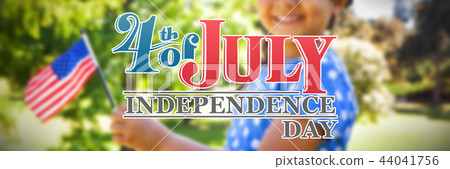 Composite image of girl holding american flag 44041756