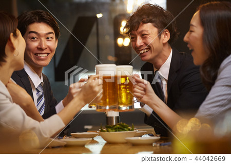 Working people drinking alcohol Working people drinking alcohol 44042669