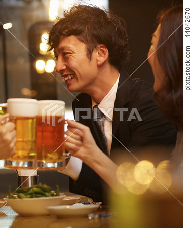 Working people drinking alcohol 44042670
