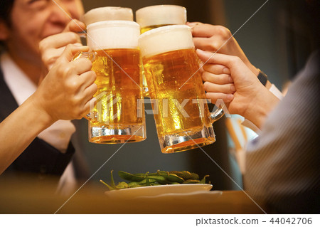 Working people drinking alcohol Working people drinking alcohol 44042706