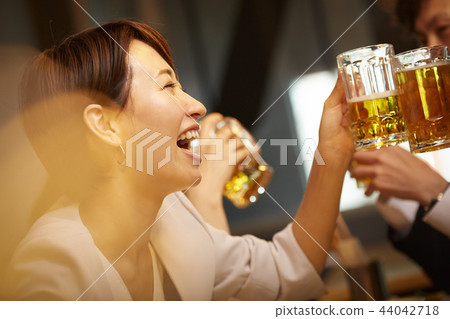 Working people drinking alcohol 44042718