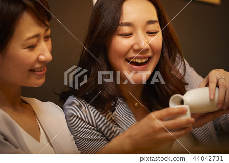 Working people drinking alcohol 44042731