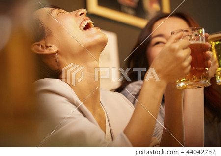 Working people drinking alcohol 44042732