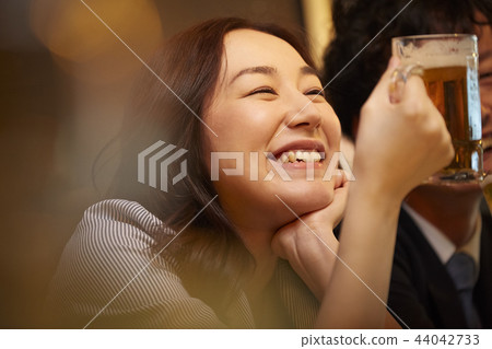 Working people drinking alcohol 44042733