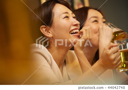 Working people drinking alcohol 44042748