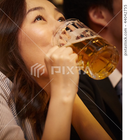 Working people drinking alcohol 44042755