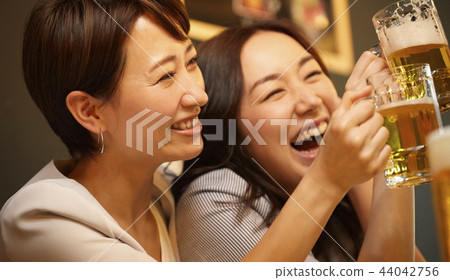 Working people drinking alcohol 44042756