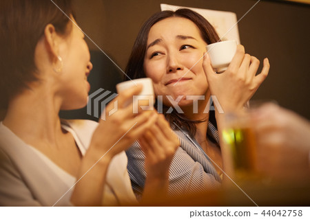 Working people drinking alcohol Working people drinking alcohol 44042758
