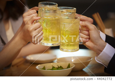 Working people drinking alcohol Working people drinking alcohol 44042772